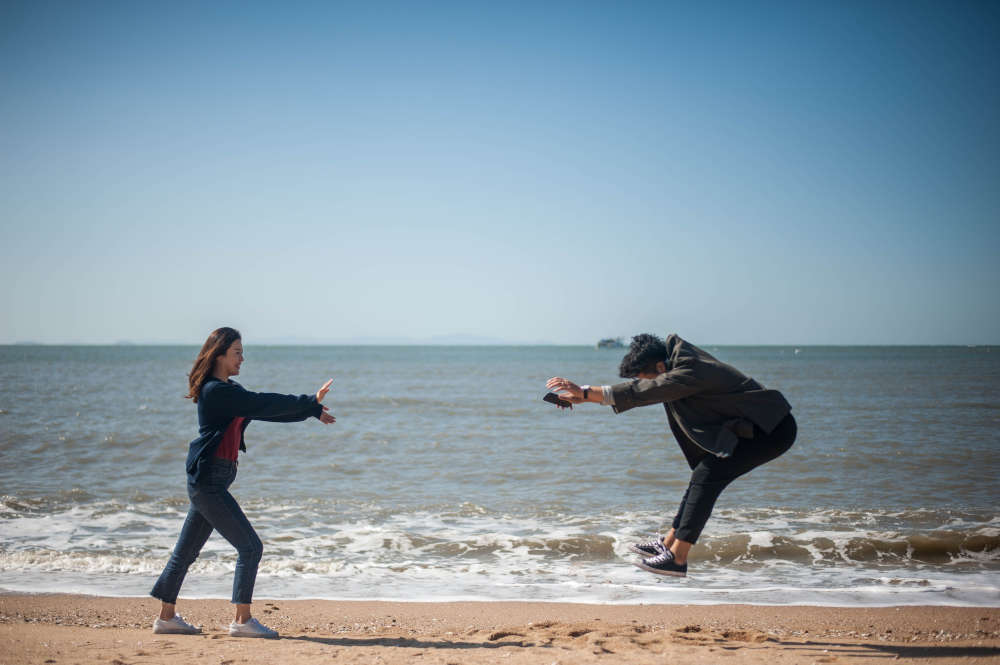 Man and woman fighting