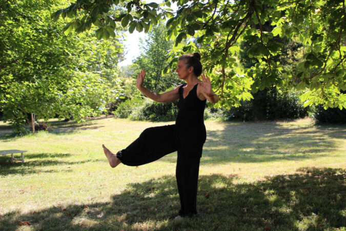 Woman practicing tai chi